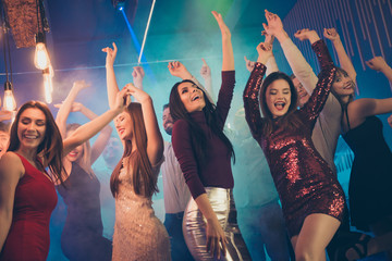 Low angle photo of crazy people students bachelorettes corporate company dance in nightclub feel...