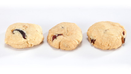 A cookie is a baked food that is typically small, flat and sweet. It usually contains flour, sugar and some type of oil or fat. It may include other ingredients such as raisins, oats, chocolate.