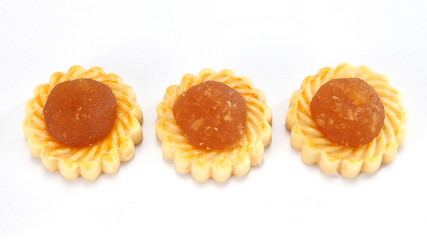 Pineapple tarts or nanas tart are small, bite-size pastries filled or topped with pineapple jam