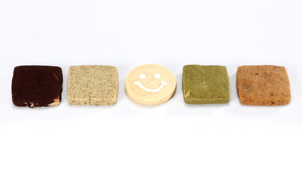 A cookie is a baked food that is typically small, flat and sweet. It usually contains flour, sugar and some type of oil or fat. It may include other ingredients such as raisins, oats, chocolate.