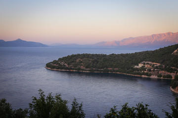 Fototapeta na wymiar Yacht Iarins and Sea Bays of the Greek Islands