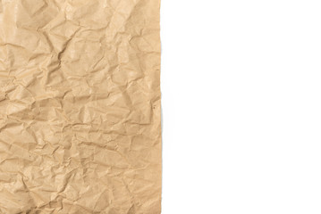 Brown crumpled paper on white background. Copy space for text