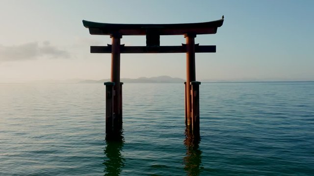 Flying through torii gate in Lake Biwa