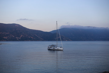 Fototapeta premium White Yacht at blue sea