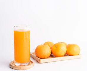 Fresh orange juice glass and fruits  on white background