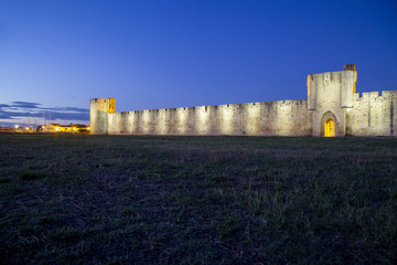 The medieval french town of Aigues Mortes in the Camargue at night.