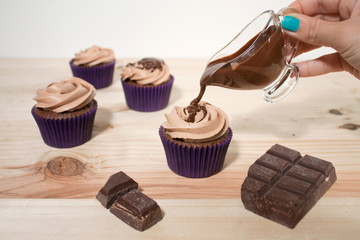 Homemade cupcakes on wood table