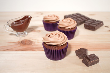 Homemade cupcakes on wood table