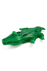 IInflatable mattress in the form of a crocodile made of durable material for fun and comfortable rest on the water. The mattress has four grips. The photo is taking on a white background.