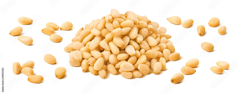 Wall mural pine nuts pile and separate kernels isolated on white background
