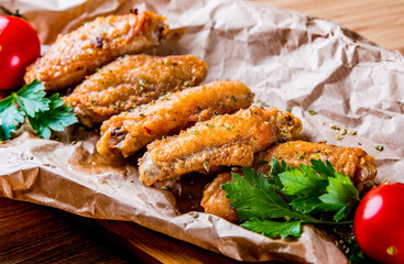 Fried Chicken Wings on wooden table background