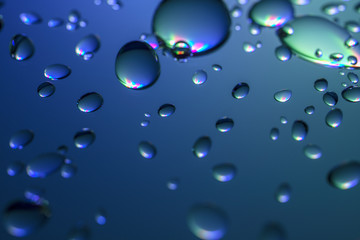 Water droplets on a translucent rainbow glass background with gradient