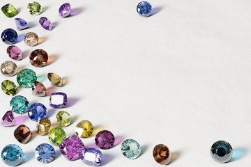 Colorful gemstones on white background