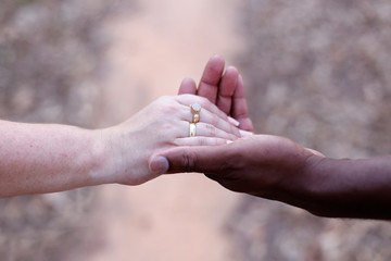 United hands and wedding rings