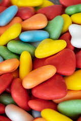 Heart shaped multicolored candies macro. 