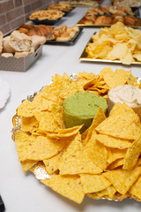 Table of appetizers with mexican nachos