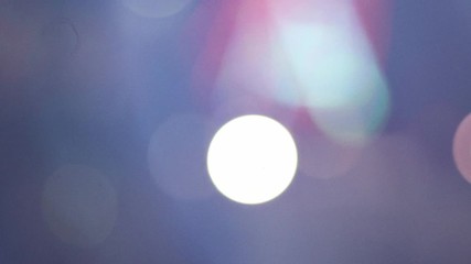 movimento su luci bokeh di ruota panoramica al luna park