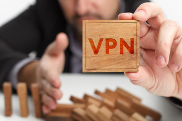 Business, technology, internet and network concept. Young businessman points to the keyword: