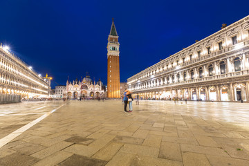 Piazza San Marco square with Basilica of Saint Mark in Venice city at night, Italy