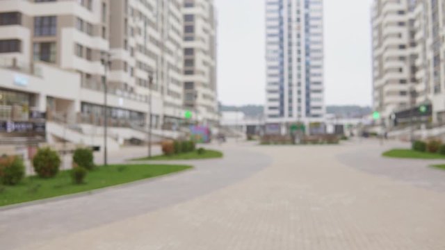 Teenage girl with afro hairstyle dancing modern hip-hop on the street