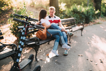 Obraz premium Closeup of electric scooters parked in the park