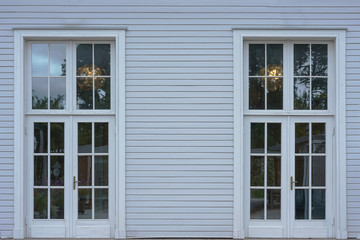 white big wooden frame door and window luxury style on gray wall outdoor