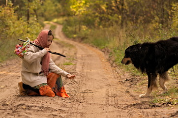 girl wanderer with a dog