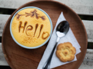 cup of coffee and chocolate cake on wooden table