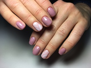 delicate pink manicure with white feathers