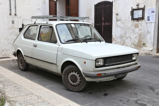 APULIA, ITALY - JUNE 6, 2017: Fiat 127 youngtimer hatchback car parked in Italy. There are 41 million motor vehicles registered in Italy.