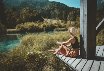 Foto op Canvas Woman enjoying freedom on nature outdoors. Travel Slovenia Europe. © nataliaderiabina