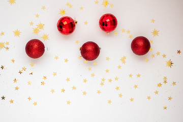 On Light Christmas background are red balls