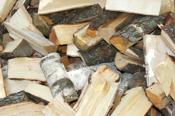 Texture of sawn wooden planks, bars in a chaotic position