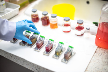 Scientists are preparing specimens for cytology to check for abnormalities in cells.