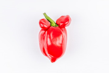 Trendy ugly organic farm vegetable - red sweet bell pepper with mutation parts on white background....