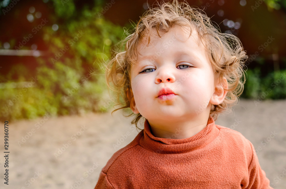 Sticker pretty little girl giving a kiss