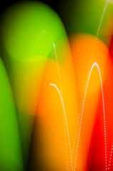 Glossy colorful Background. Light Painting with balls. Abstract