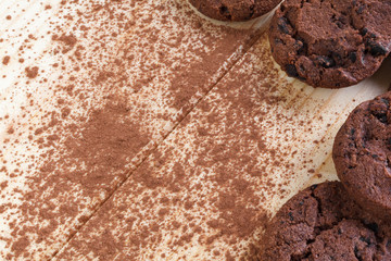 Tasty cookies with chocolate chips placed on a wooden background . Selective focus shot.