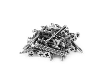 A pile of long wood screws on a white background