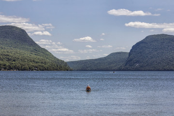 Fototapeta na wymiar Wading in New England Lake