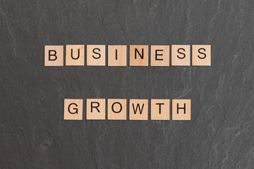 business growth written with game tiles