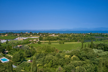 Panoramic view of the meadows and mountains of Lake Garda