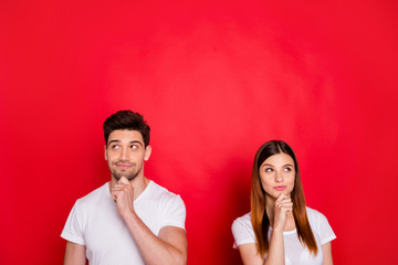 Photo of curious interested planning couple of friends thinking on when sales start touching their...