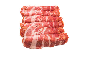 Chevapchichi in bacon isolated on white background.