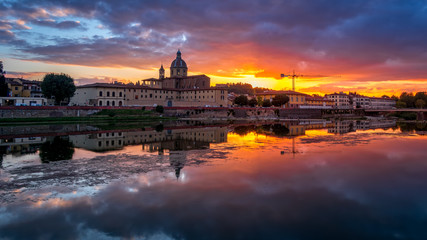 FLORENCE, TUSCANY/ITALY - OCTOBER 19 : View of buildings along the River Arno at dusk  in Florence  on October 19, 2019