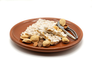 plate with nougat and almonds, christmas food