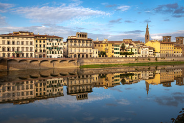 Fototapeta premium FLORENCE, TUSCANY/ITALY - OCTOBER 18 : View of buildings along and across the River Arno in Florence on October 18, 2019. Unidentified people.