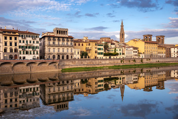 Fototapeta na wymiar FLORENCE, TUSCANY/ITALY - OCTOBER 18 : View of buildings along and across the River Arno in Florence on October 18, 2019. Unidentified people.