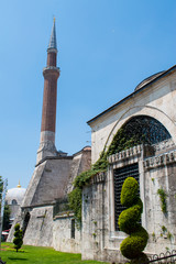 Fototapeta na wymiar Istanbul, Turkey: one of the minarets of Hagia Sophia, famous former Greek Orthodox Christian patriarchal cathedral, later Ottoman imperial mosque, now a museum, epitome of Byzantine architecture
