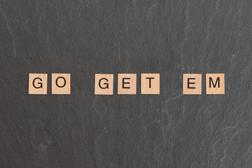 Go Get Em Written With Game Tiles